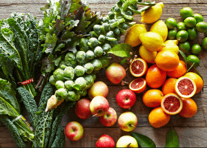 a group of fruits and vegetables on a wood surface Healthy Weight Loss Diets Bristol